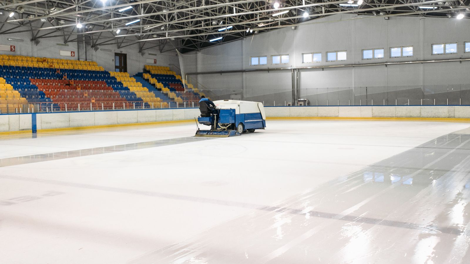 Ice resurfacer on an indoor hockey rink